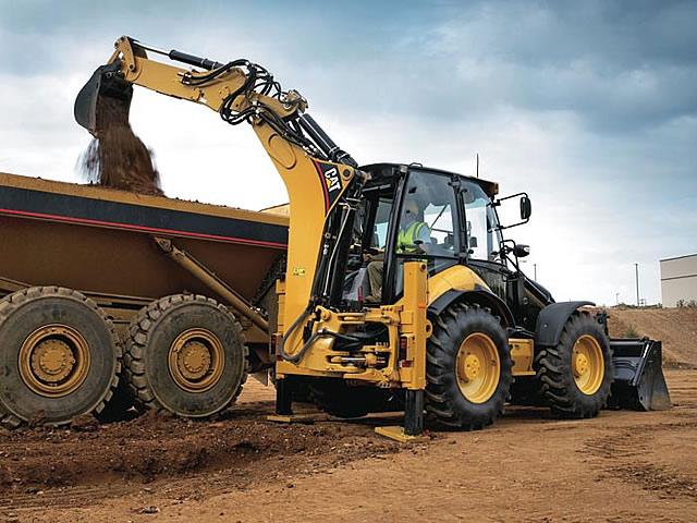 Caterpillar GRABER pri nakládke materiálu